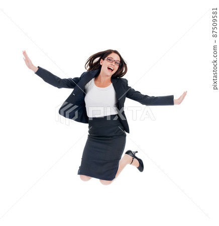 Success has her over the moon. Studio shot of an ecstatic looking businesswomen jumping for joy isolated on white. 87509581