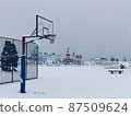 Basket goal in the snow 87509624