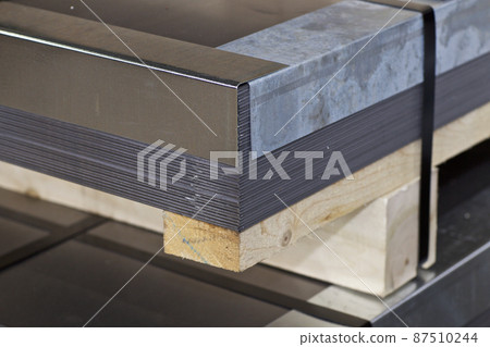Galvanized sheet in packs in metal products warehouse Galvanized sheet in packs in metal products warehouse 87510244