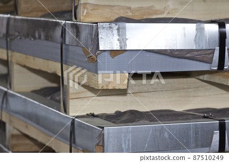 Galvanized sheet in packs in metal products warehouse Galvanized sheet in packs in metal products warehouse 87510249