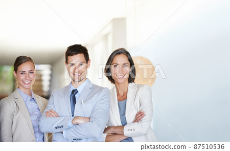 Confidence always wins out in the end. Portrait of three successful and happy businesspeople standing together. Confidence always wins out in the end. Portrait of three successful and happy businesspeople standing together. 87510536