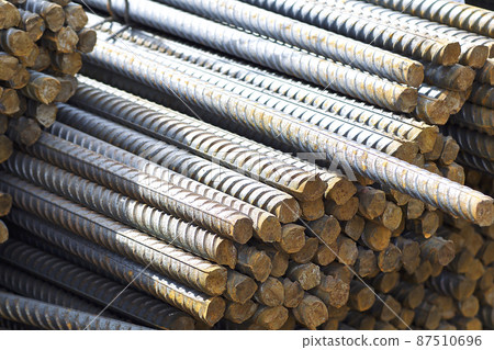 Reinforcing bars with a periodic profile in the packs are stored in the metal products warehouse Reinforcing bars with a periodic profile in the packs are stored in the metal products warehouse 87510696