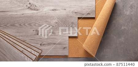 Laminate wood floor at cork background texture. Wooden laminate floor Laminate wood floor at cork background texture. Wooden laminate floor 87511440