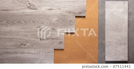 Laminate wood floor at cork background texture. Wooden laminate floor Laminate wood floor at cork background texture. Wooden laminate floor 87511441