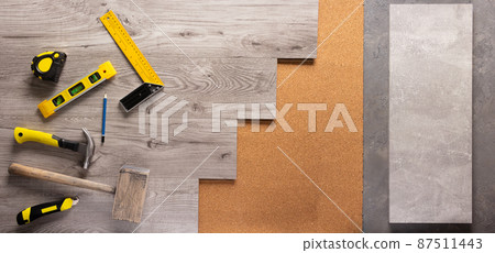 Wood laminate and tools on floor background texture Wood laminate and tools on floor background texture 87511443