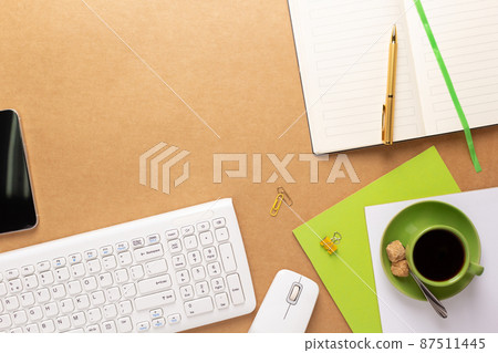 Computer keyboard and mouse at paper background. Business office flat lay Computer keyboard and mouse at paper background. Business office flat lay 87511445