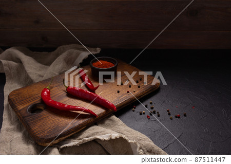 Chile pepper and tomato sauce ingredient for homemade cooking on table. Recipe concept Chile pepper and tomato sauce ingredient for homemade cooking on table. Recipe concept 87511447