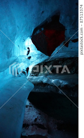 An ice cave of incredible beauty. Blue gradient An ice cave of incredible beauty. Blue gradient 87513374