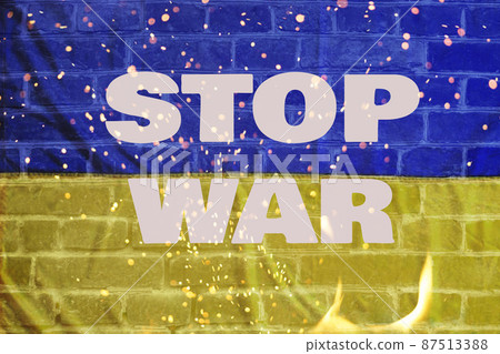 Flag of Ukraine on fire with text stop war Flag of Ukraine on fire with text stop war 87513388