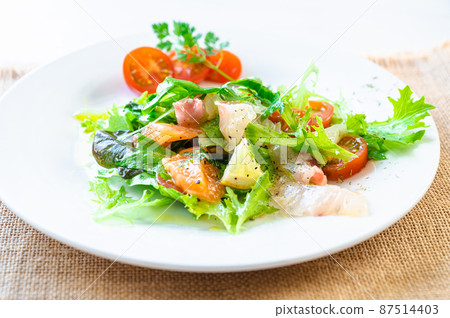 Raw salmon and sea bream carpaccio Raw salmon and sea bream carpaccio 87514403