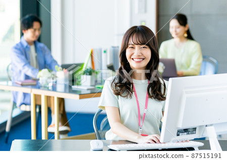 Young female engineer working in an office 87515191