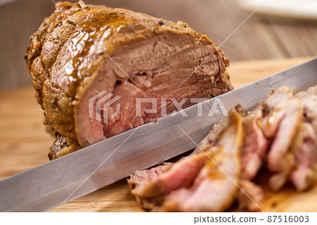 Roast Beef on a Cutting Board. High quality photo Roast Beef on a Cutting Board. High quality photo 87516003