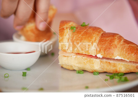 detail shot of club sandwich on wooden table detail shot of club sandwich on wooden table 87516501