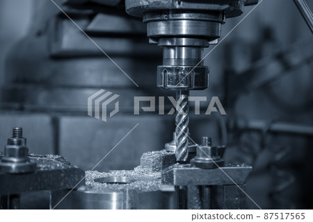 The milling process the metal plate part with NC milling machine. 87517565