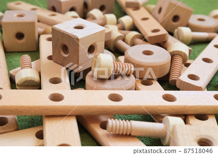 Toys assembled with wooden bolts and nuts 87518046