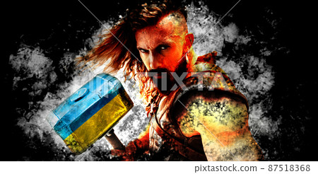 Conceptual collage with brave, courage man, warrior with huge hammer painted in blue-yellow colors of ukrainian flag. 87518368