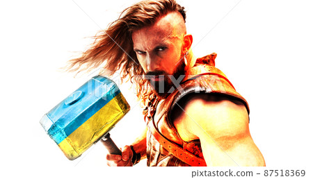 Conceptual collage with brave, courage man, warrior with huge hammer painted in blue-yellow colors of ukrainian flag. Conceptual collage with brave, courage man, warrior with huge hammer painted in blue-yellow colors of ukrainian flag. 87518369