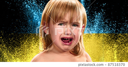 Conceptual collage with crying little kid shouting, asking for help isolated on blue and yellow colors of Ukrainian flag background. Stop war, save children Conceptual collage with crying little kid shouting, asking for help isolated on blue and yellow colors of Ukrainian flag background. Stop war, save children 87518370