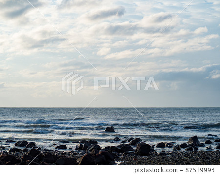 Beach shot with sand and rocks Beach shot with sand and rocks 87519993