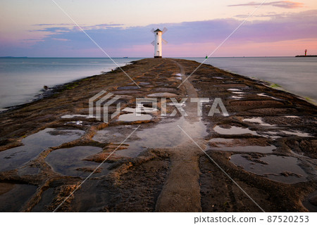 Lighthouse windmill Stawa Mlyny, Swinoujscie, Baltic Sea, Poland 87520253