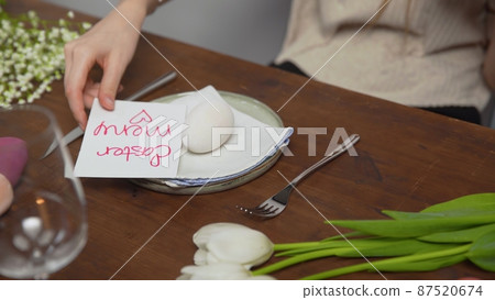 Close-up on a table with items to create a composition for Easter. Easter menu. Church holiday-Easter Close-up on a table with items to create a composition for Easter. Easter menu. Church holiday-Easter 87520674