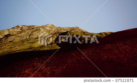 amazing scenery of colored mountain and sky at background in sunset 87522871