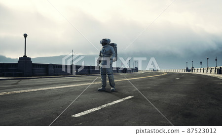 astronaut in space suit on the road bridge 87523012