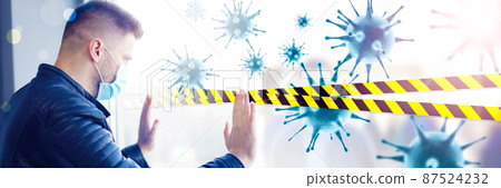 Young man in sterile face mask against corona virus. 87524232