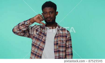Upset man in casual shirt showing thumbs down sign gesture, disapproval, dissatisfied dislike Upset man in casual shirt showing thumbs down sign gesture, disapproval, dissatisfied dislike 87525545