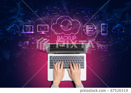 Backup concept with person using laptop 87526319