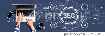 SEO concept with person using laptop 87526456