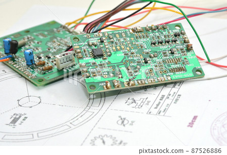 Old semiconductor / repair image placed on the blueprint of the pendulum clock Old semiconductor / repair image placed on the blueprint of the pendulum clock 87526886