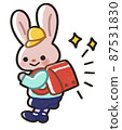 Rabbit carrying a school bag on his back 87531830