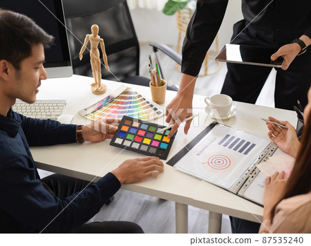 Close-up, Graphic designers working together as a teamwork Close-up, Graphic designers working together as a teamwork 87535240