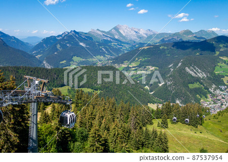 Gondola in mountain landscape. La Clusaz, France Gondola in mountain landscape. La Clusaz, France 87537954
