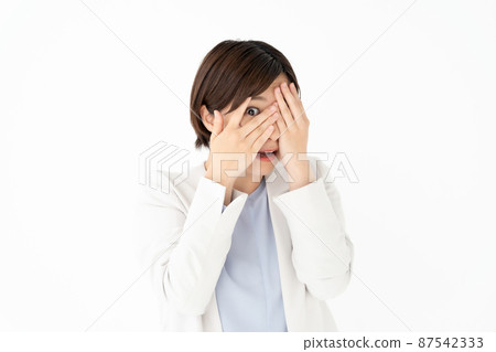 A woman who covers her eyes A woman who covers her eyes 87542333