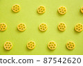 Macaroni lined up in polka dots 87542620