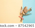 Bouquet on yellow and blue background 87542965