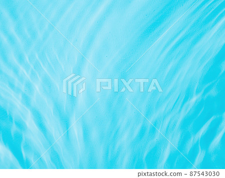 Ripple water texture with shadows on blue 87543030