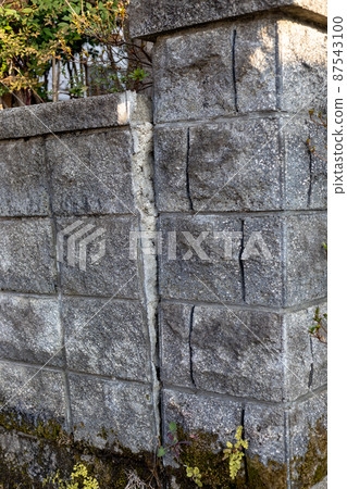 Dangerous block wall that is likely to crack and fall Dangerous block wall that is likely to crack and fall 87543100