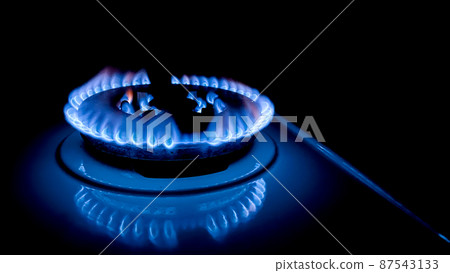 Stove gas burner flame black background sanctions Stove gas burner flame black background sanctions 87543133