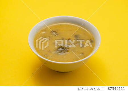 vegetable soup with spinach in beautiful bowl and spoon vegetable soup with spinach in beautiful bowl and spoon 87544611