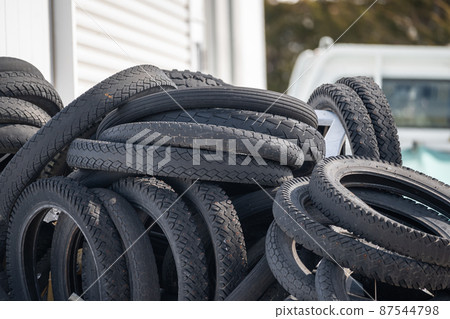 Old tires loaded Old tires loaded 87544798