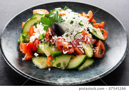 Traditional Bulgarian shopska salad with tomato,cucumber and bulgarian sirene cheese 87545266