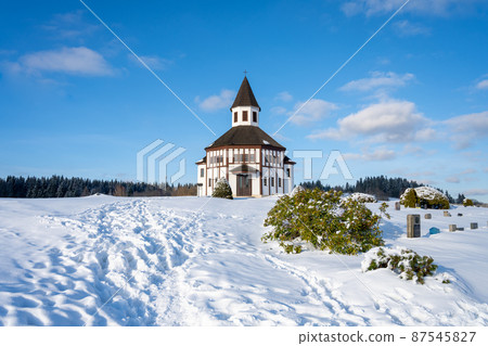 Wooden evangelic chapel in Tesarov in wintertime Wooden evangelic chapel in Tesarov in wintertime 87545827