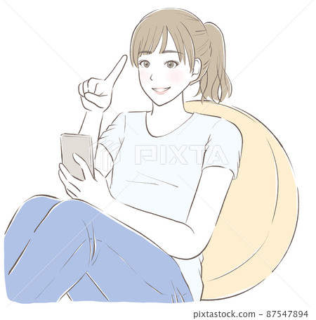 A woman who operates a smartphone while leaning on a cushion A woman who operates a smartphone while leaning on a cushion 87547894