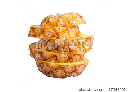Pineapple fruit and Pineapple slices isolated on a white background. Pineapple fruit and Pineapple slices isolated on a white background. 87548602
