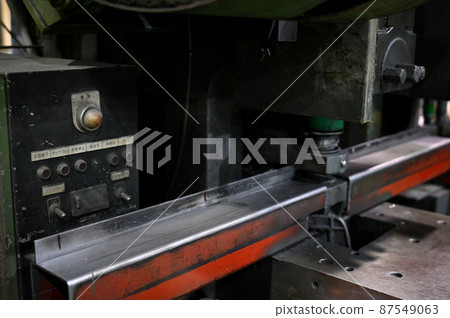 Punch press, auto puncher, hole punching, factory, manufacturing industry 87549063