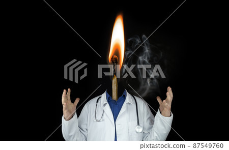 Match concept. Motivated doctor. Doctor at work. A healthcare worker who loves his job. Work with joy and passion. Burning at work. Ideological person. Psychological stability Match concept. Motivated doctor. Doctor at work. A healthcare worker who loves his job. Work with joy and passion. Burning at work. Ideological person. Psychological stability 87549760