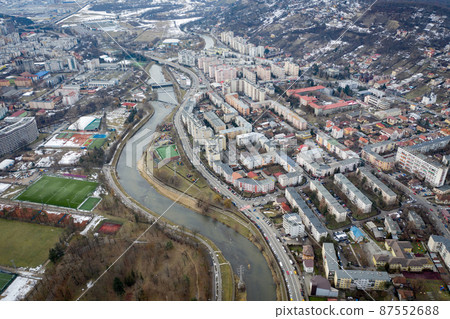 Aerial above view of river crossing the city Aerial above view of river crossing the city 87552688